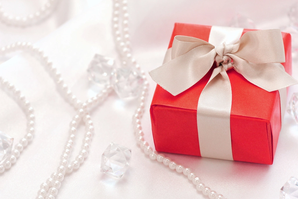 Pearl Necklaces and Red Gift Box Photo