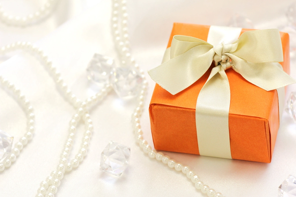 Pearl Necklaces and Orange Gift Box Photo