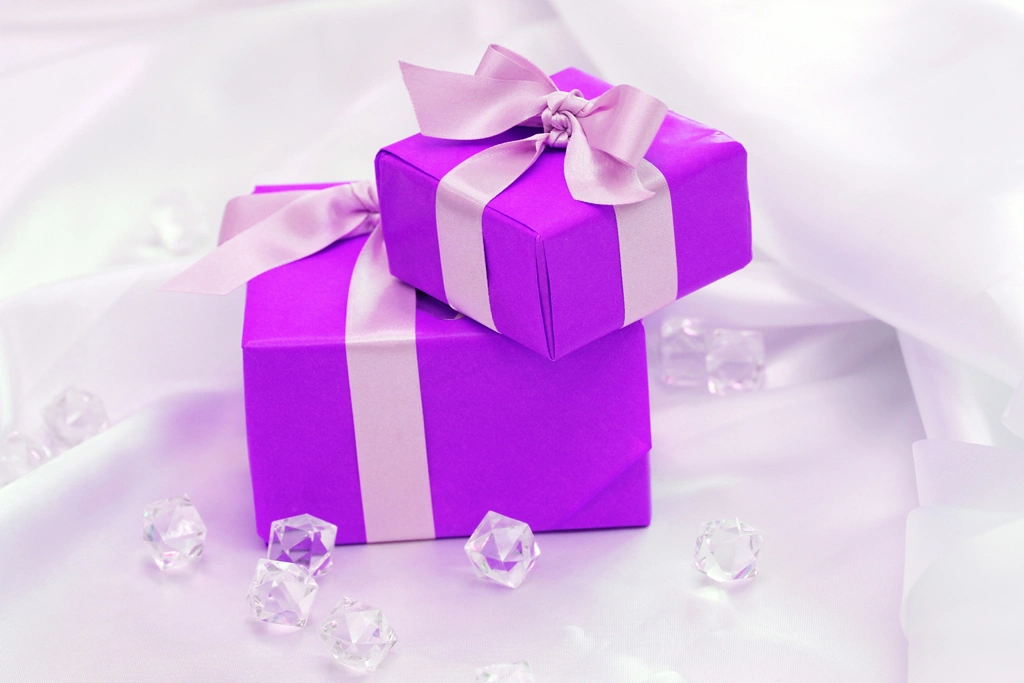 Two Purple Gift Boxes and Glass Cubes Photo