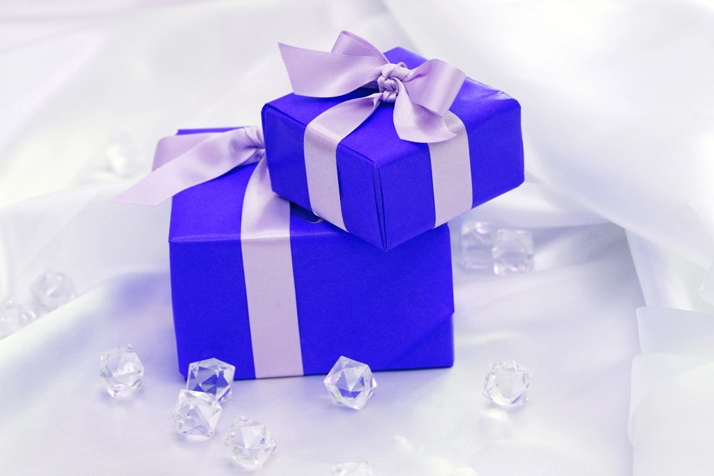 Two Blue Gift Boxes and Glass Cubes Photo