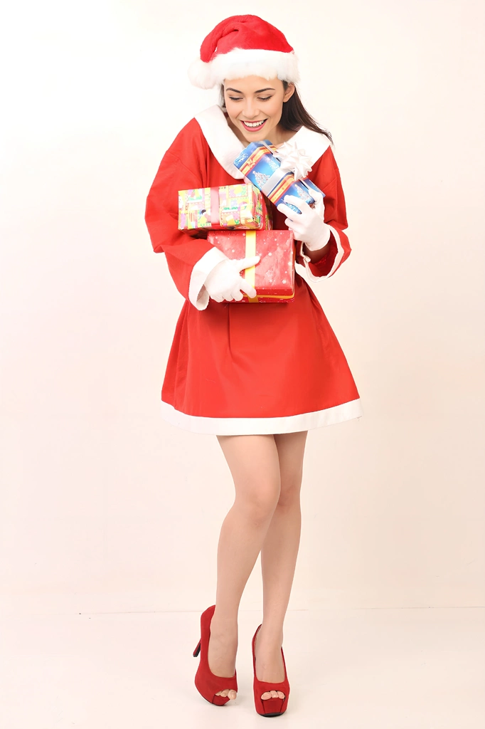 Portrait of a Woman in a Santa Claus Costume About to Drop Christmas Gifts #2, Photo