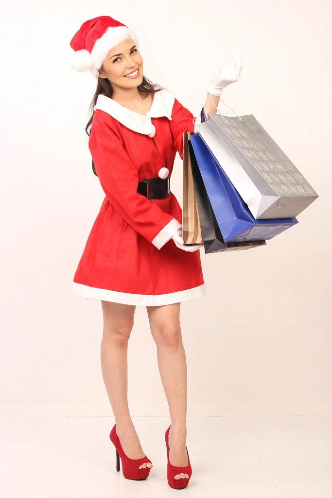 Portrait of a Woman in Santa Costume After Christmas Sale Shopping #2, Photo