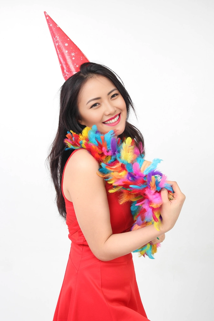Ser of 5 Portrait Photos of a Woman Wearing a Party Hat and a Feather Shawl Around Her Neck | Asian Woman #1 （face change by AI）