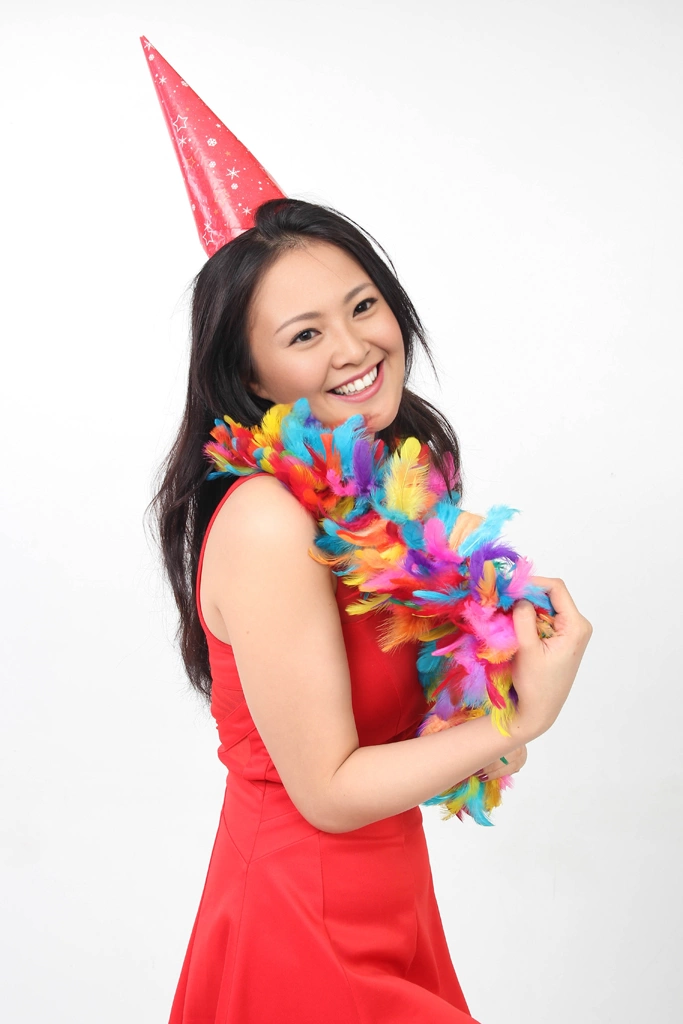 Ser of 5 Portrait Photos of a Woman Wearing a Party Hat and a Feather Shawl Around Her Neck | Asian Woman #2 （face change by AI）