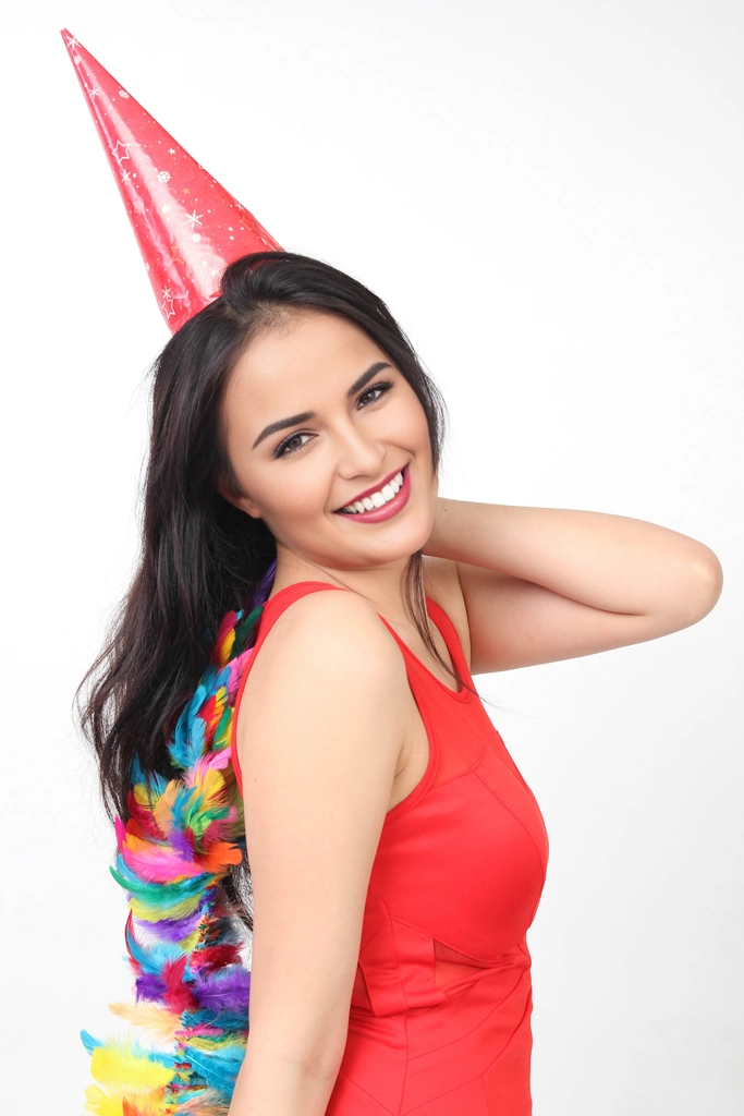 Ser of 5 Portrait Photos of a Woman Wearing a Party Hat and Holding a Colorful Feather Shawl | Woman #2 （face change by AI）